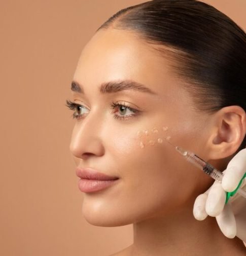 cosmetologist-making-rejuvenating-anti-wrinkle-injections-young-woman-face-female-aesthetic_726520-967