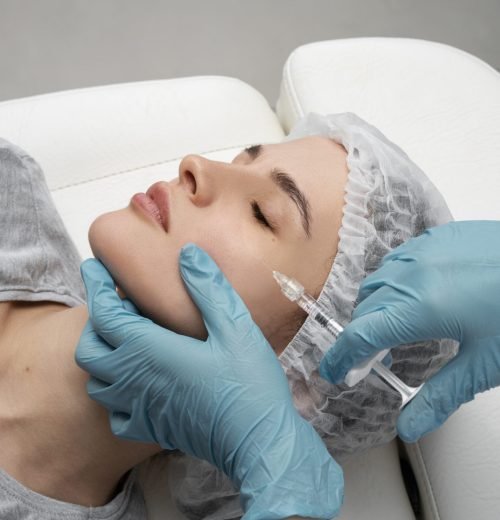 high-angle-woman-getting-injection